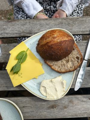 Sourdough bun with whipped butter and cheese at Kaf in Copenhagen