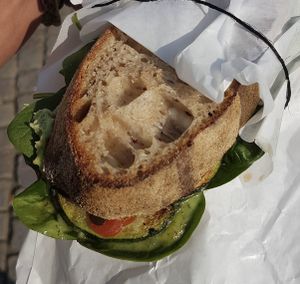 Excellent greek "cheese" & zucchini sandwich with avocado, on sourdough bread.  at Kaf in Copenhagen