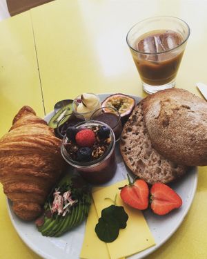 Sourdough, butter, jam, nutella, cheese, chia pudding with granola, passionfruit, kiwi, strawberries, avocado and croissant 😍 at Kaf in Copenhagen