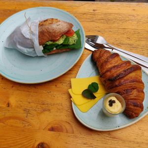 Croissant with vegan cheese and butter and sandwich at Kaf in Copenhagen