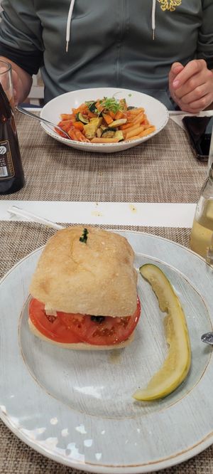 Vegan pasta and caprese sandwich at The Nomad Cafe in Melbourne