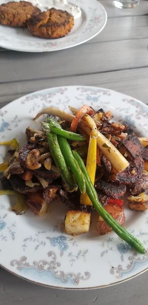 Beet steak and vegan crab cakes at The Nomad Cafe in Melbourne