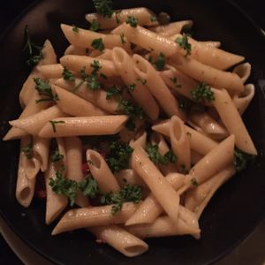 Pasta with dried tomatos and parsley at Blatouch in Prague