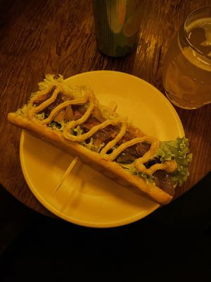 Hot dog with mustard, caramelized onions and pickles 😍.   at Blatouch in Prague