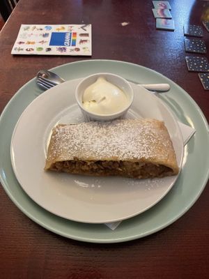 Apple cinnamon strudel cake with a side of whipped cream  at Blatouch in Prague