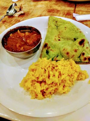 veg curry, tumeric rice, and vegan naan at Milan Nataraj in Tokyo