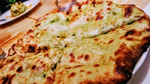 Potatoes and spice filled bread. at Milan Nataraj in Tokyo