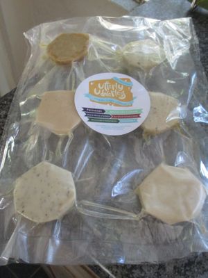 Don't know which cheese to choose? Try the cheese platter to decide which is/are your favorites. From top left to bottom right: Parmesan, Mozzarella & Chives, Sharp White Cheddar, Sun-dried tomato & Basil, Mozzarella & Italian herbs and Camembert. at Purple Myrtle Vegans in Johannesburg