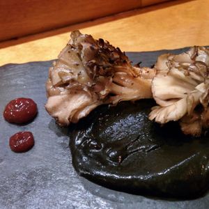 Charcoal grilled maitake mushrooms with black sesame paste and a pickled plum sauce.  at Arami in Chicago