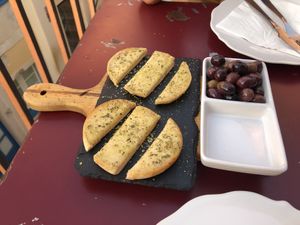 Bolo do caco/ Aceitunas at Maria Portuguesa Tapas in Coimbra