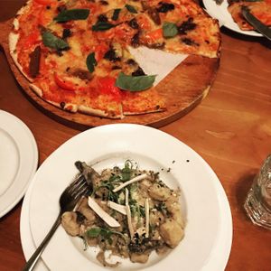 Vegan pizza (with vegan sausage and cheese) and mushroom gnocchi  at Tutto Bene in Christchurch