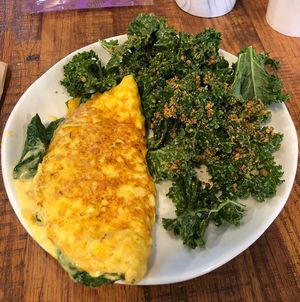 vegan just egg omelet and kale salad  at Love Life Cafe in Miami
