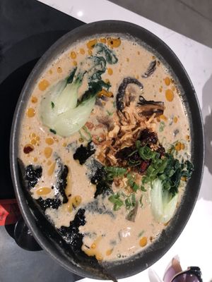Shrooms ramen - creamy wild mushroom tonkatsu broth, ramen noodles, smoked oyster mushrooms, baby bokchoi, crispy onions, scallions chili-garlic oil 
  at Love Life Cafe in Miami
