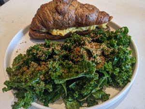 Croissandwich with Kale salad at Love Life Cafe in Miami