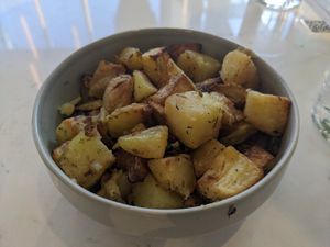 Side of roasted golden potatoes at Love Life Cafe in Miami