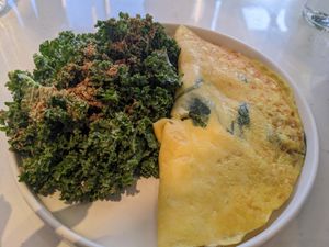 Omelette with kale salad at Love Life Cafe in Miami