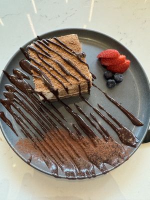 The best tiramisu I have ever had. The waiter said it’s cashew based and gluten free. Please make sure you get this if you like Tiramisu. It’s fantastic !  at Love Life Cafe in Miami