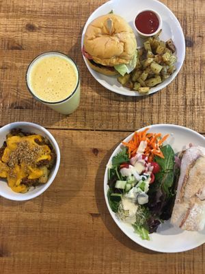 Choripan, cheeseburger, loaded fries. at Love Life Cafe in Miami