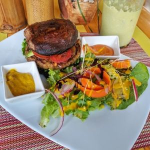 Burger with 2 Portobello mushrooms instead of bread! at Clorofila in Playa Del Carmen