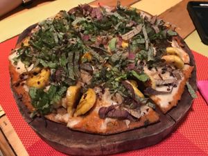 Pizza with greens, mushrooms and sweet plantains at Clorofila in Playa Del Carmen