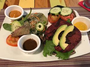 Beet burger on Portobello with greens at Clorofila in Playa Del Carmen