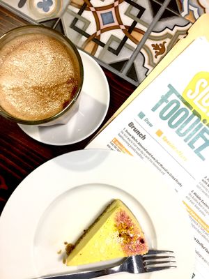 Raw orange / ginger cake and oat milk latte  at Slow Foodiez in Budapest