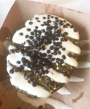 Avocado with tahini dressing and crispy lentils at Whole Heart Provisions in Allston
