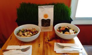 Fresh made 'Cheesy' Kale chips, wheatgrass shots made to order, creative bowls and beautiful salads with in-house hand made vegan sauces & dressings.  at Right Path Organic Cafe in New London