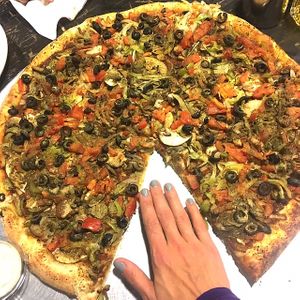 Enormous vegan pizza!! at Ronny's Pizza in Tbilisi