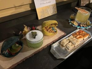 2 cocktails, part of the aperitivo (included 3 more small dishes not pictured )  at Smile Tree Cocktail Bar in Turin