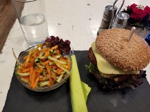 Pea protein burger, vegan cheese, GF bun, free veggies came with it at Veggiezz - Am Salzgriess in Vienna