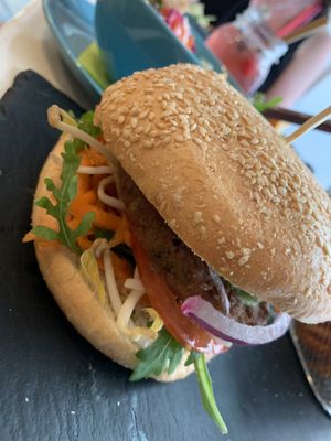 Delight burger! The orange mustard and crispy patty were delish! at Veggiezz - Am Salzgriess in Vienna