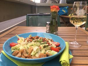 Cesar salad and vegan white wine  at Veggiezz - Am Salzgriess in Vienna