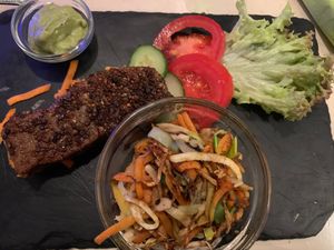Seitan pepper steak, guacamole and ‘grilled vegetables' at Veggiezz - Am Salzgriess in Vienna