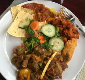 Delicious Sambar, Raita, Okra Curry, salad, Papad, Chutneys from Weekday buffet.  at India Bhavan in Green Bay