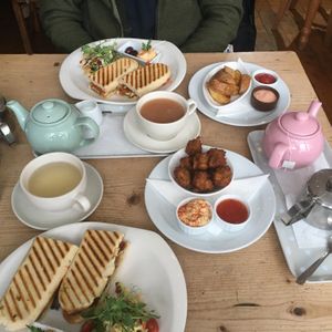 Paninis, wedges, fritters (come with humus and chilli sauce) , teas. The only sauce that isn’t vegan is the mayo (pictured with the wedges) at The Veggie Cafe in Ilkley