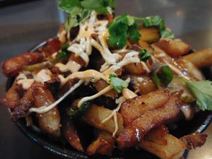 $6.00 Bahn Mi Poutine: Delicious 😋 lots of interesting flavors at Ramen Hood in Los Angeles