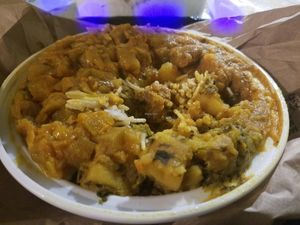 Large Plate(pick 3 over rice)w/ alu masala, soy protein curry, and squash at Punjabi Grocery & Deli in New York City