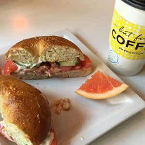 fresh bagel with tomato cucumber and vegan cream cheese at Joy Cafe in Philadelphia