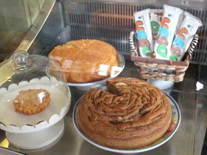Two big vegan cakes and one small non-vegan cake.  at Dona Flor Cafe in Cascais