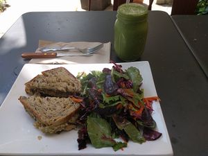 Vegan Egg Salad on toasted seeded sourdough with small side salad and Greeña Colada at Greenmouth in Easton