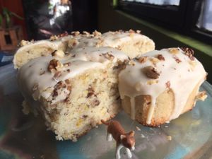 orange & walnuts cake, covered with vanilla glaze and crushed walnuts   at Kome Vegan in Valparaiso