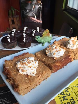peanut butter blondies topped with vegan chantilly and crushed walnuts   at Kome Vegan in Valparaiso