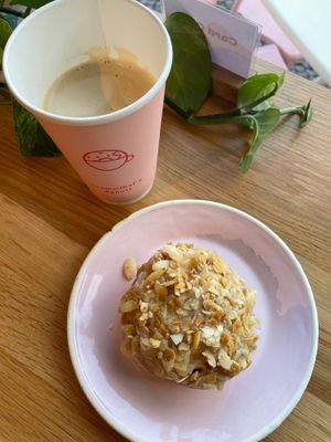 Oat Milk Cappuccino, Bienenstich Donut at Brammibal's Donuts - Maybachufer in Berlin