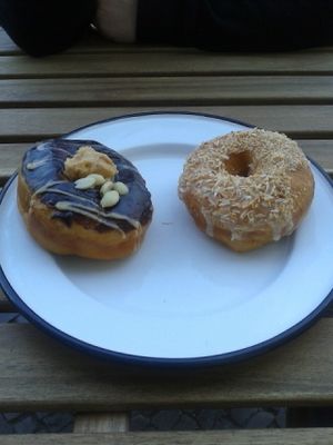 Chocolate peanut butter and salted caramel white chocolate donuts at Brammibal's Donuts - Maybachufer in Berlin