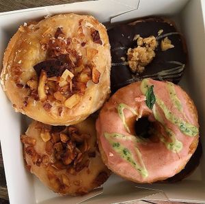 strawberry&basil + choc peanut fudge + maple smoked coconut  ❣️  at Brammibal's Donuts - Maybachufer in Berlin