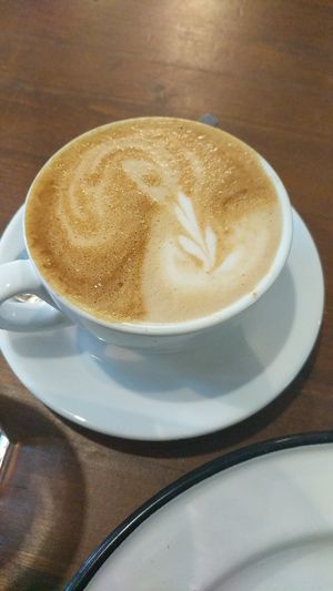 Oat mylk cappuccino at Brammibal's Donuts - Maybachufer in Berlin