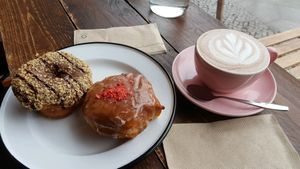 Tonka bean and nougat donuts with a cup of hot chocolate at Brammibal's Donuts - Maybachufer in Berlin