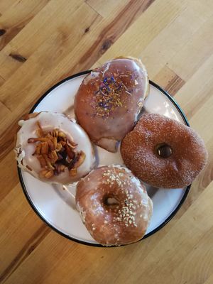 Salted caramel, cinnamon and sugar, maple and bacon, and lemon and bergamot flavored donuts at Brammibal's Donuts - Maybachufer in Berlin