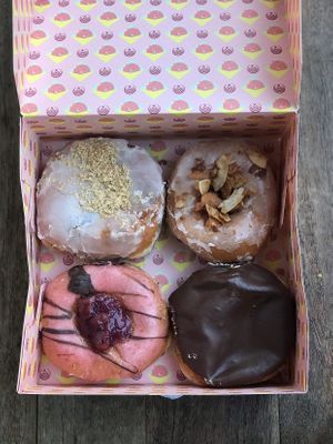 Plum, maple/coconut, cherry, boston at Brammibal's Donuts - Maybachufer in Berlin